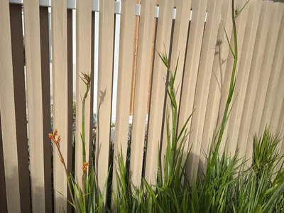 Woodonali woodgrain aluminium as fence and gate infill — Fences & Gates project