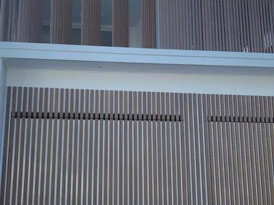 Woodonali woodgrain aluminium on a building facade — Facades project