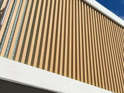 Woodonali woodgrain aluminium on a building facade — Facades project