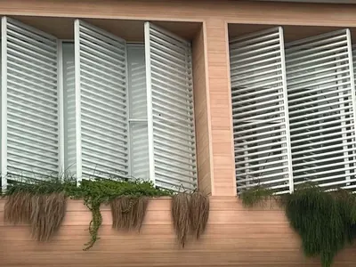 Woodonali woodgrain aluminium on a building facade — Facades project