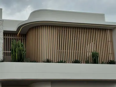 Woodonali woodgrain aluminium on a building facade — Facades project