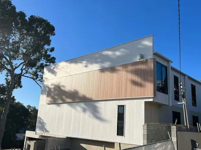 Woodonali woodgrain aluminium on a building facade — Facades project