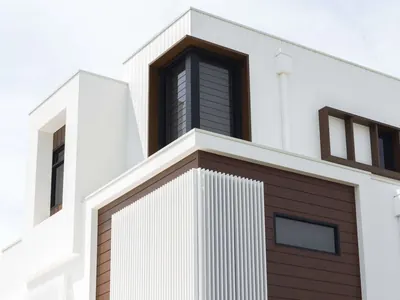 Woodonali woodgrain aluminium on a building facade — Facades project