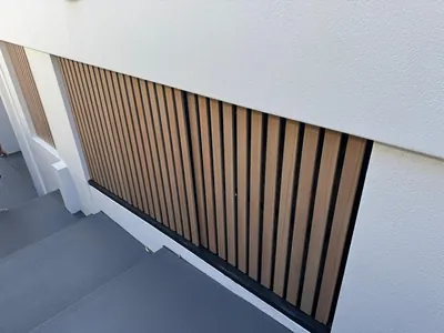 Woodonali woodgrain aluminium on a building facade — Facades project