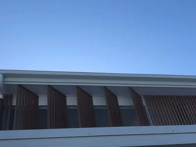 Woodonali woodgrain aluminium on a building facade — Facades project