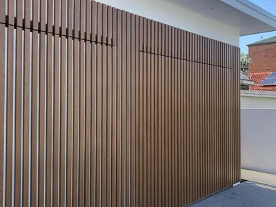 Woodonali woodgrain aluminium as fence and gate infill — Fences & Gates project